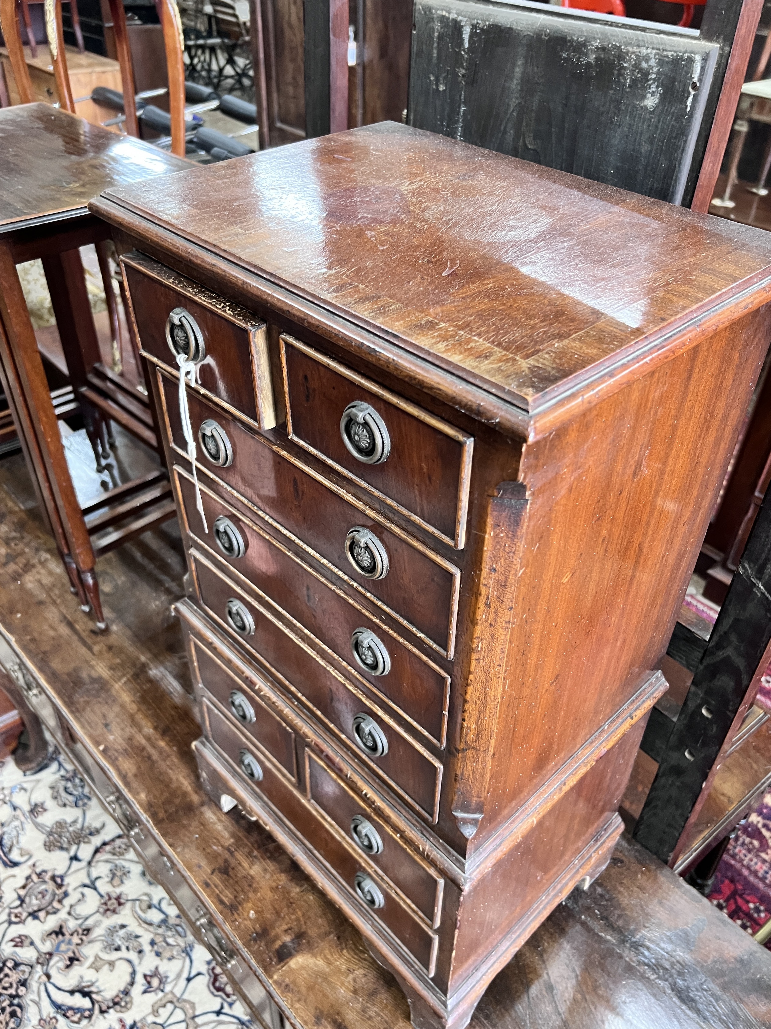 A small reproduction mahogany chest, width 41cm, depth 29cm, height 76cm